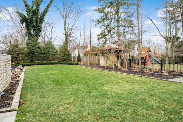 view of yard with a playground