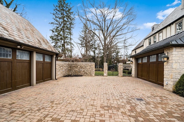 view of patio / terrace with a garage