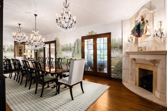 2528 Tremont Rd, Columbus, OH 43221 - dining space with a chandelier, french doors, wood finished floors, and crown molding
