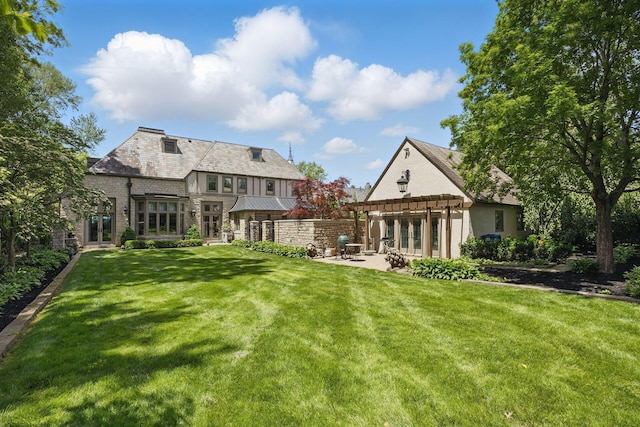 2528 Tremont Rd, Columbus, OH 43221 - rear view of property featuring a pergola, french doors, a patio area, and a yard