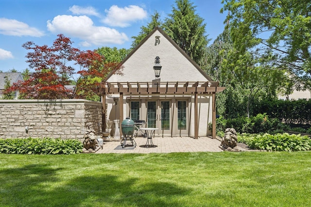 2528 Tremont Rd, Columbus, OH 43221 - back of property featuring a pergola, french doors, a lawn, stucco siding, and a patio area