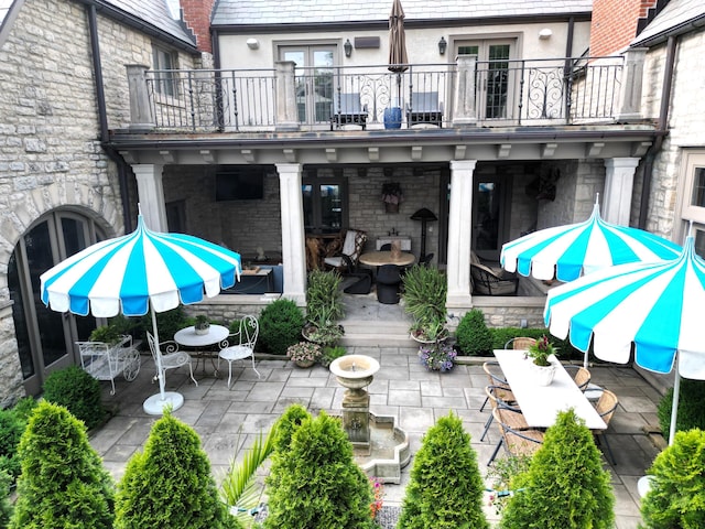 2528 Tremont Rd, Columbus, OH 43221 - view of patio / terrace with a balcony, french doors, and outdoor dining space