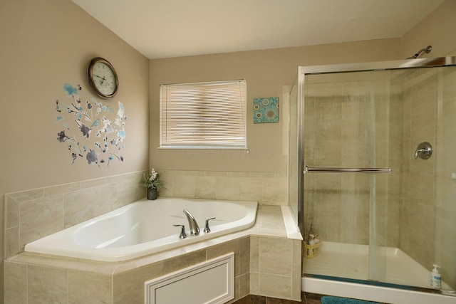 bathroom featuring plus walk in shower