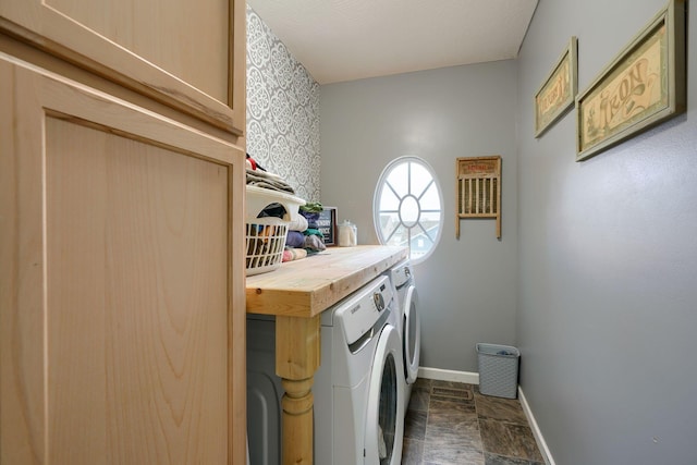 clothes washing area featuring washing machine and dryer