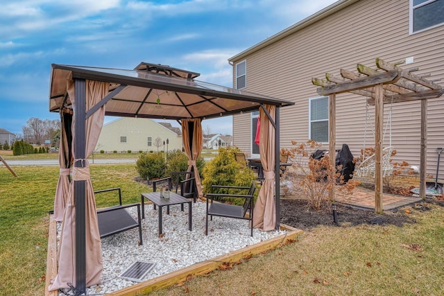 view of yard featuring a gazebo and a pergola