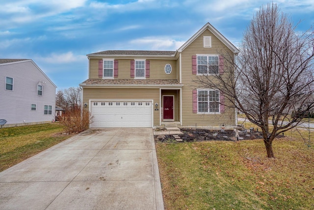 view of front property featuring a garage and a front lawn