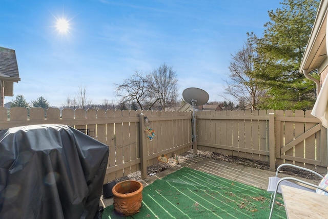 view of patio with a grill