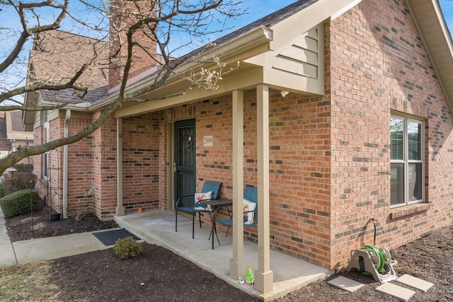 entrance to property with a patio area