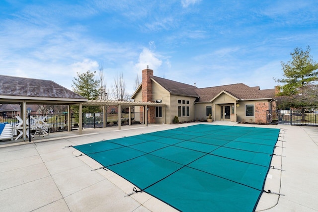 view of pool featuring a patio area