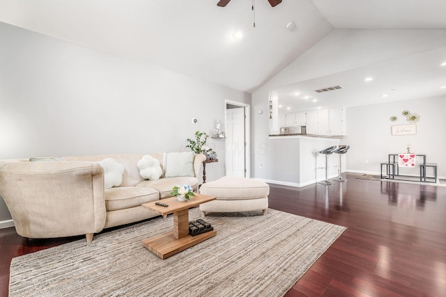 living room with high vaulted ceiling, dark wood-type flooring, and ceiling fan