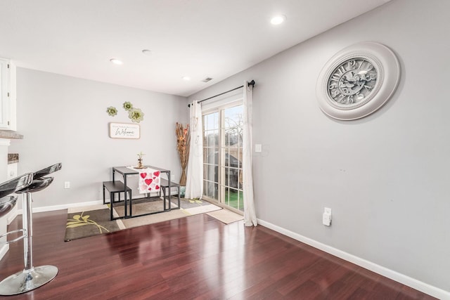 living area with wood-type flooring