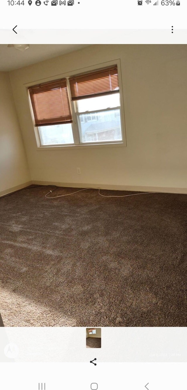 view of carpeted spare room