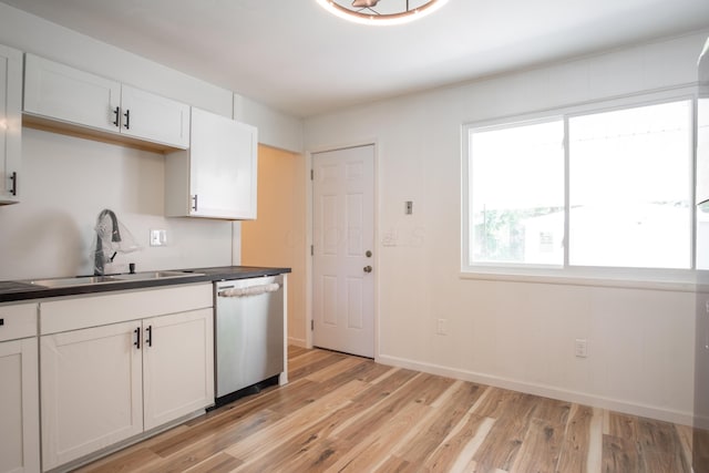 kitchen with dishwasher, sink, white cabinets, and light hardwood / wood-style floors