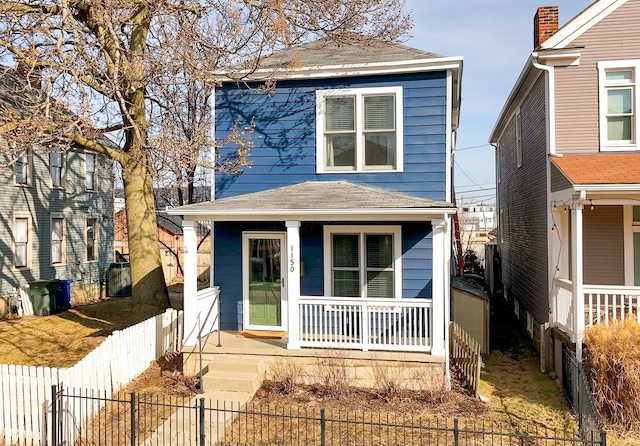 view of property featuring a porch