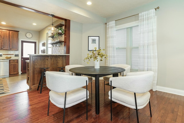 dining room featuring dark hardwood / wood-style flooring