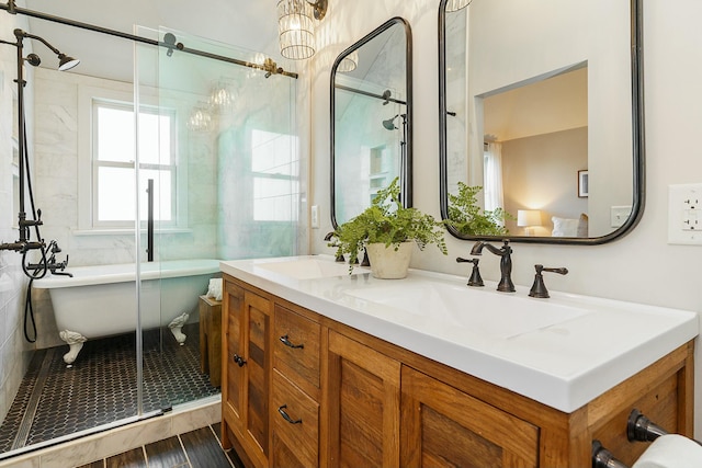 bathroom with independent shower and bath and vanity