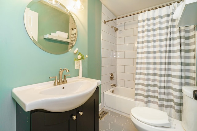 full bathroom featuring vanity, tile patterned flooring, shower / bath combination with curtain, and toilet