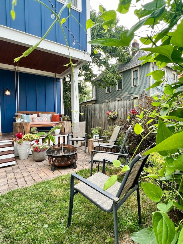 view of patio / terrace featuring a fire pit