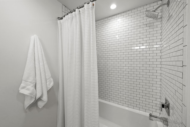 bathroom with shower / bath combo