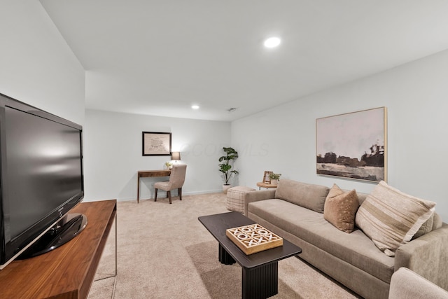 living room featuring light carpet