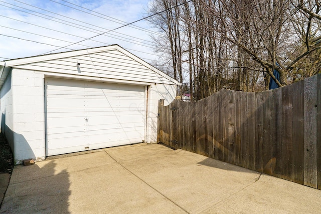 detached garage with fence