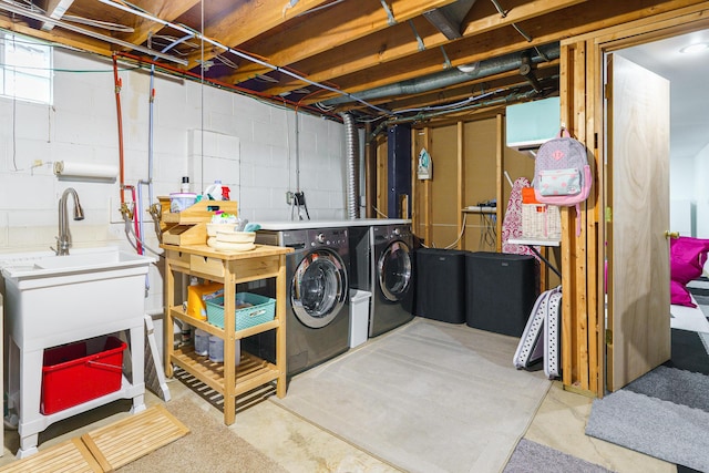 unfinished below grade area featuring washer and dryer