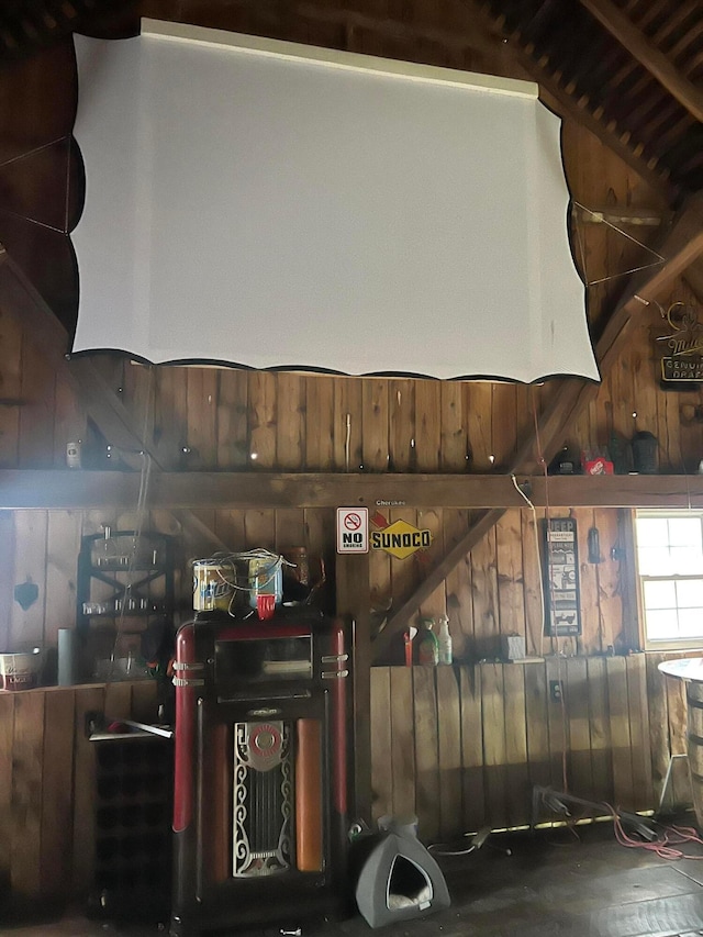 interior space featuring wood walls