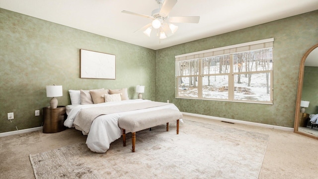 bedroom with carpet, visible vents, and baseboards