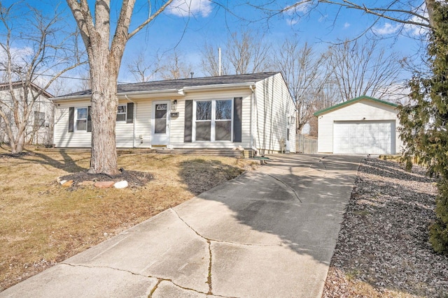 view of front of property with a garage and an outdoor structure