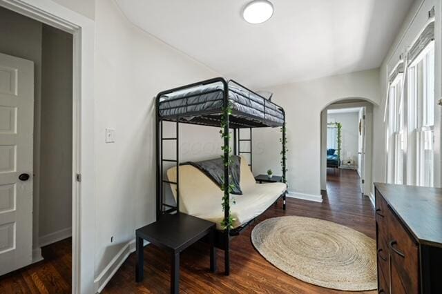 bedroom featuring dark wood-type flooring