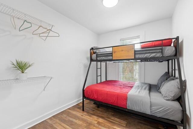 bedroom with hardwood / wood-style floors