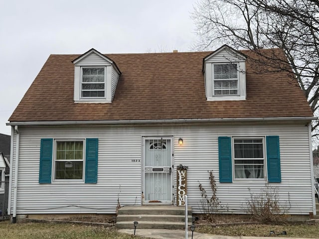 view of new england style home