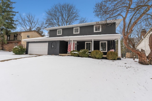 traditional-style home featuring a garage