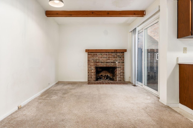 unfurnished living room with light carpet, a fireplace, and beamed ceiling