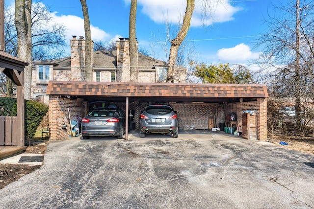 exterior space featuring a carport