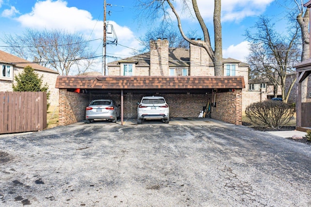 exterior space with a carport