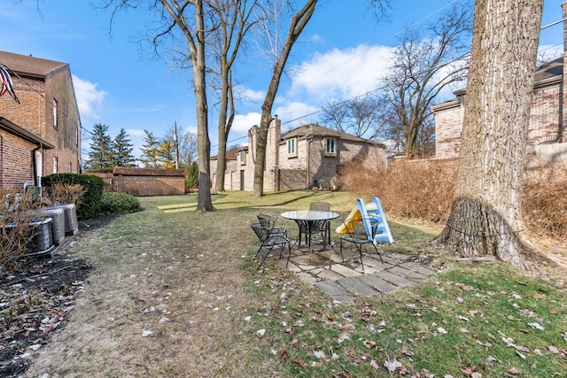 view of yard featuring central AC unit