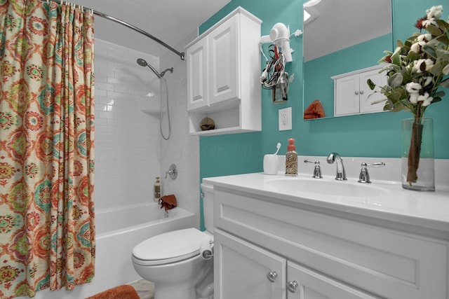 full bathroom featuring vanity, shower / tub combo with curtain, and toilet