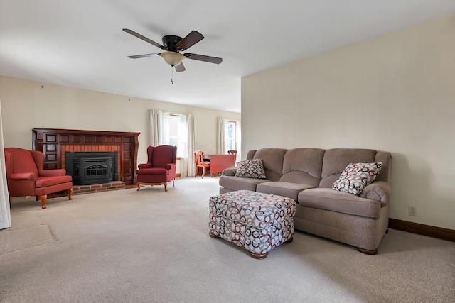 carpeted living room with ceiling fan