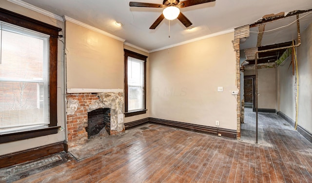 unfurnished living room featuring crown molding, ceiling fan, and hardwood / wood-style floors