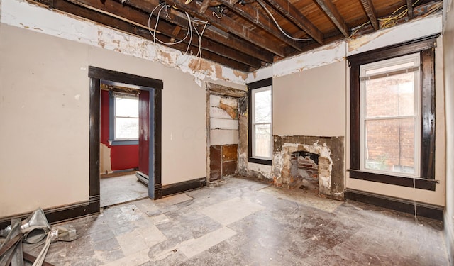 unfurnished living room with a fireplace