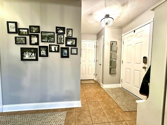 view of tiled foyer entrance