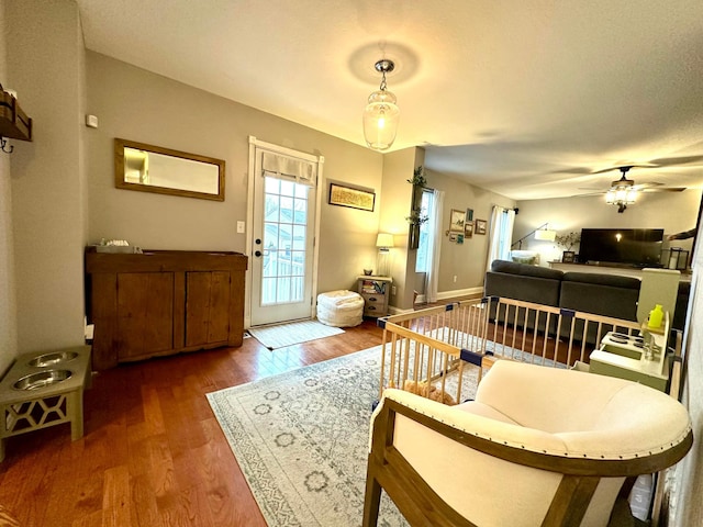 entrance foyer with wood-type flooring and ceiling fan