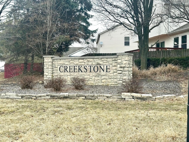 community sign with a lawn