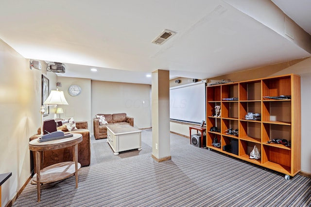 living area with carpet floors, recessed lighting, visible vents, and baseboards