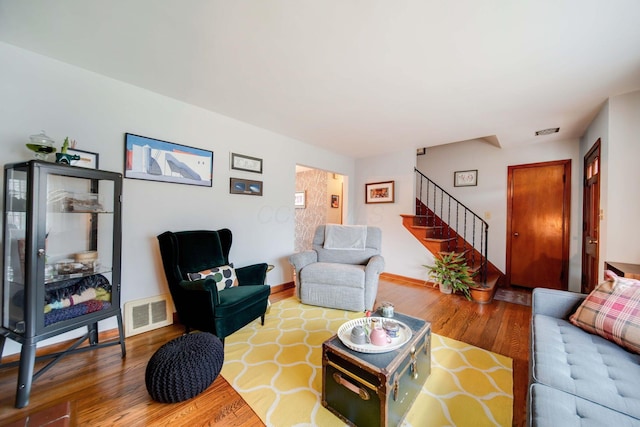 living room with wood-type flooring