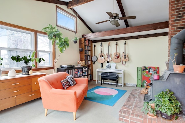 interior space featuring ceiling fan, high vaulted ceiling, a healthy amount of sunlight, and beam ceiling