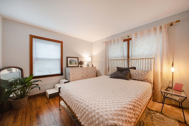 bedroom featuring hardwood / wood-style flooring