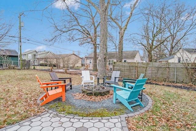 view of yard with a patio area and a fire pit