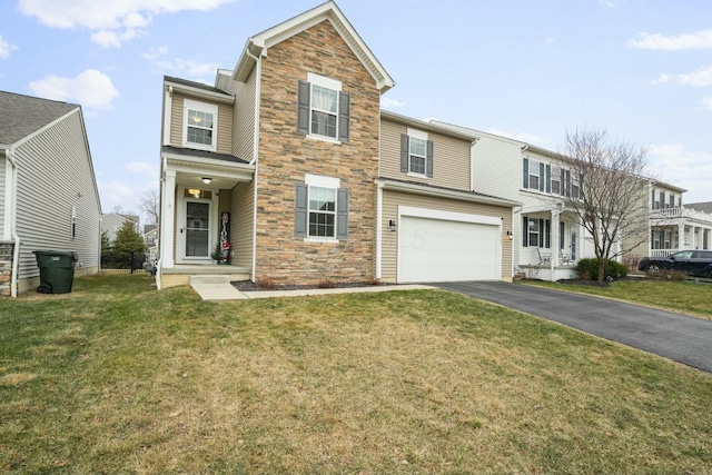 view of front facade featuring a garage and a front lawn